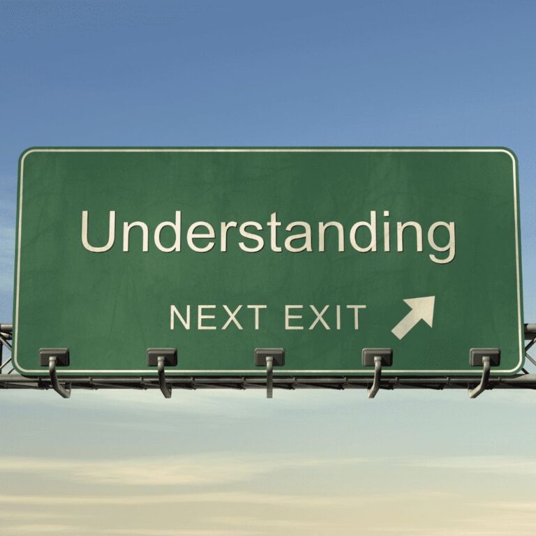 Et skilt på motorvejen, hvor der står "Understanding - next exit".